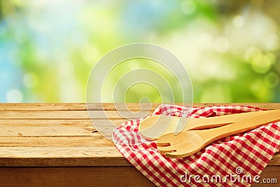 Cooking outdoor background with wooden spoons Stock Photo