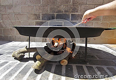 Cooking Paella,typical dish of Spanish gastronomy Stock Photo