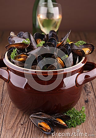 Cooking pot with mussels Stock Photo