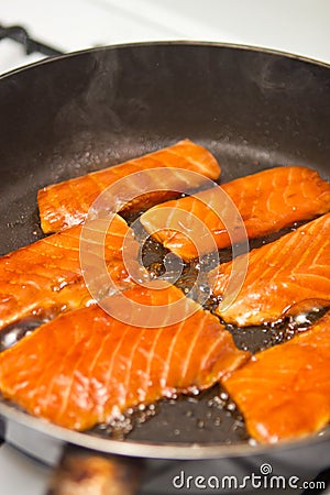 Cooking salmon Stock Photo