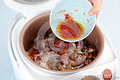 Cooking seafood in Multicooker Stock Photo