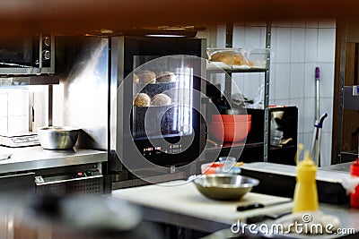 Cooking sesame buns preparing in the oven Stock Photo