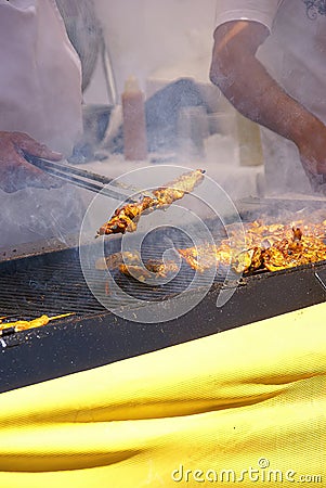 Cooking spicy kebabs Stock Photo