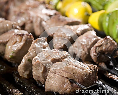 Cooking Steak and Vegetable Skewers Stock Photo