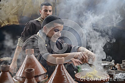 Cooking of traditional Moroccan tajin dish Editorial Stock Photo