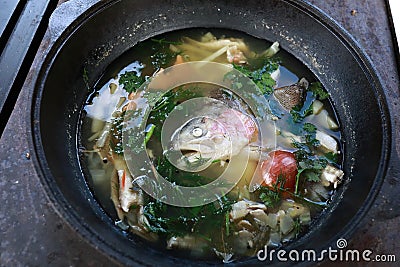 Cooking of ukha trout fish soup Stock Photo