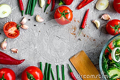 Cooking vegetables on the stone background top view Stock Photo