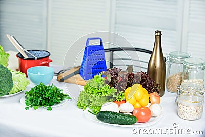 Cooking vegetables useful tips. Table with culinary utensils and vegetables ingredients. Welcome to world of tastes Stock Photo