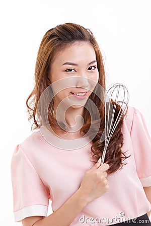 Cooking woman or housewife, holding whisker Stock Photo