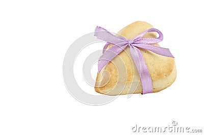 Cooky heart with pink ribbon Stock Photo