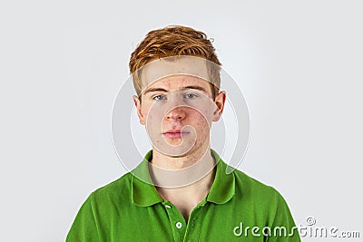 Cool boy in green shirt with red Stock Photo