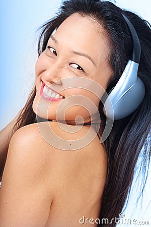 Cool chick listening to music Stock Photo