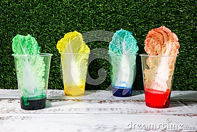 Cool and fun science experiment for school children kids colorful lettuce cabbage leaf in food coloring Stock Photo