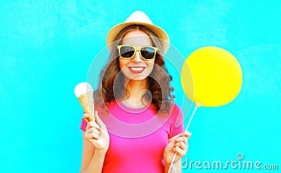 Cool girl with yellow air balloon and ice cream cone Stock Photo