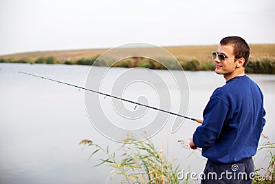 Cool guy fishing Stock Photo