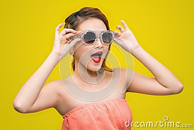 Cool hipster asian woman wearing eyewear glasses smiling happy. Stock Photo