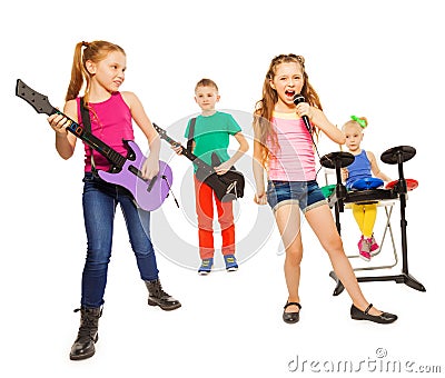 Cool kids play musical instruments as rock group Stock Photo