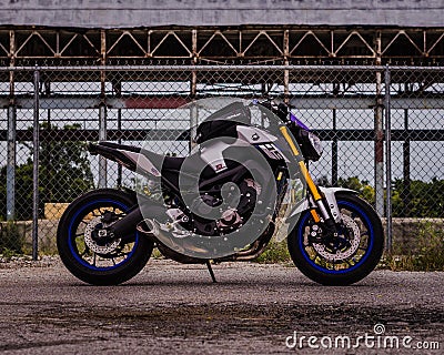 Cool looking Motorcycle against a old building Editorial Stock Photo