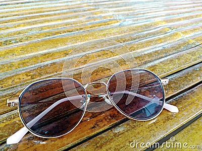 cool and trendy glasses on a bamboo table Stock Photo