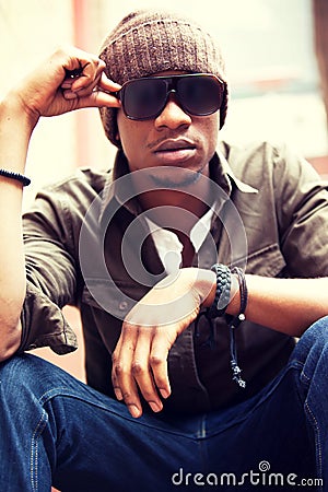 Cool Urban Black Male in Beanie and Shades Stock Photo