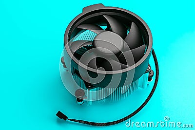 Cooling fan on a turquoise background. Single object. Black ventilator of computer. Cooler of pc. Stock Photo