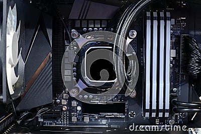 Cooling pump on CPU socket and quad channel RAM DDR4 that installed on modern mainboard Stock Photo