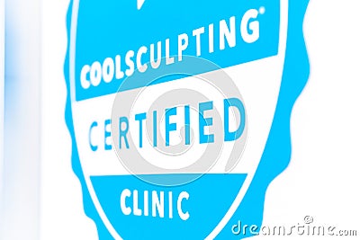 Coolsculpting certified badge decal displayed at a beauty laser clinic offereing cryolipolysis Editorial Stock Photo