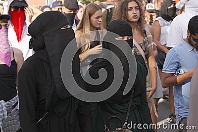 Muslim women protest at demonstration against Danish legislation that ban the use of traditional clothes like burqa and niqab. Editorial Stock Photo