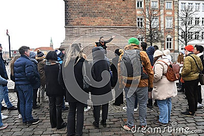 Copenhagen /Denmark/18 February 2023/Tourists gether for walk city guide tour in danish capital Copenhagen.( Photo.Francis Jos Editorial Stock Photo