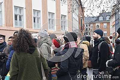 Copenhagen /Denmark/18 February 2023/Tourists gether for walk city guide tour in danish capital Copenhagen.( Photo.Francis Jos Editorial Stock Photo