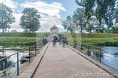 Views on bridge and peoples over moat to Kastellet fortress Editorial Stock Photo