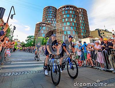 Copenhagen, Denmark - June 29 2022: Movistar Team cycling with colorful Palads Cinema in the background at the Team Presentation Editorial Stock Photo