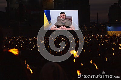 Ukrainian President Zelensky speaks via broadcast to a large crowd of people Editorial Stock Photo