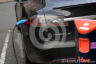 AMERICAN TESLA ELECTRIC AT CHARGE POINT IN KASTUP Editorial Stock Photo
