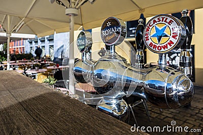 Beer dispenser for three brands at the al fresco eatery Editorial Stock Photo