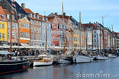 Copenhagen, Denmark. View of Nyhavn pier with colorful buildings and ships Editorial Stock Photo