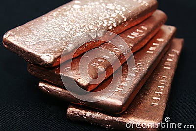 Copper bars invest money scrap copper precious metal gold silver scrap yard casting metal Stock Photo