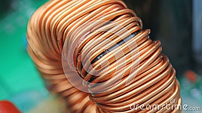 Copper coil on a circuit board Stock Photo