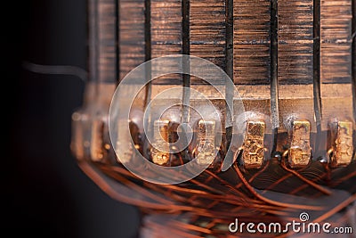 Copper commutator bar of the electric motor close up Stock Photo