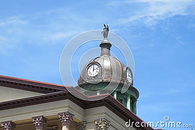 Copper dome, clocks and statue atop Lancaster County, PA courthouse. Stock Photo