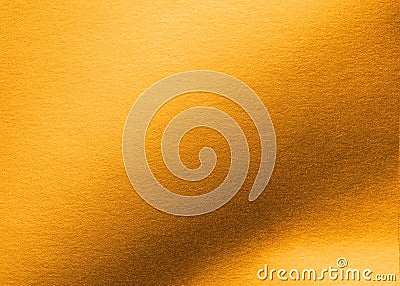 Copper gold paper texture metallic wrapping foil sheet shiny orange background for wallpaper decoration Stock Photo