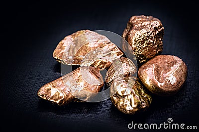 Copper nugget, a chemical element with the symbol Cu from Latin cuprum, at room temperature copper is in a solid state Stock Photo