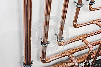 Copper pipes and fittings for carrying out plumbing work Stock Photo