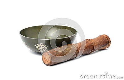 Copper singing bowl and wooden mallet isolated on white background. Musical instrument for meditation, relaxation, various medical Stock Photo