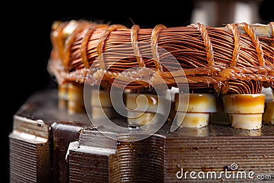 Copper winding of the electric motor. Spare parts for the repair of electrical appliances Stock Photo