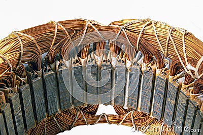 Copper winding of the electric motor. Spare parts for the repair of electrical appliances Stock Photo