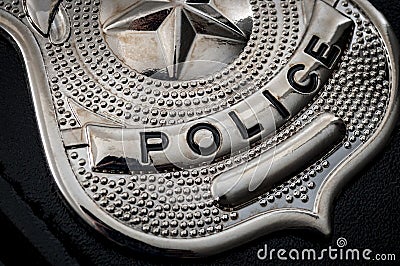 Cops and police officer badge with macro close up on the Stock Photo