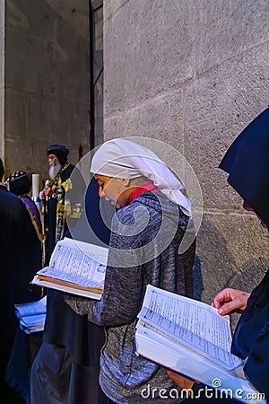 Coptic pray, on Orthodox Good Friday, Holy Sepulchre church Editorial Stock Photo