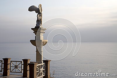 A copy of ancient Greek sculpture Nike of Samothrace in the park of the sanatorium Aivazovsky Editorial Stock Photo