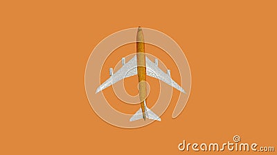 Copy space Airplane in flight on orange background, model passenger plane copy space Stock Photo